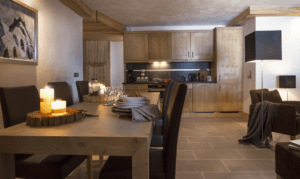 An image of the kitchen dining area in one of the apartments